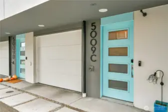 Front entry of home with one car garage