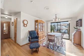 dining space with slider out to patio