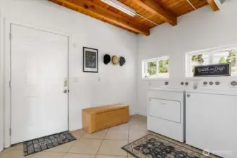 Entry with laundry and storage closets out of view on the left.