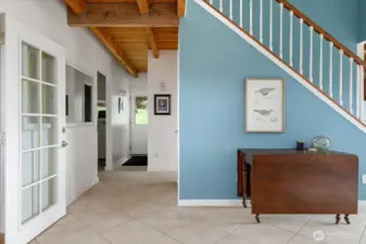 Stairs are open to the living room.