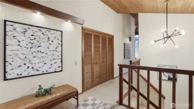 Stairway by entrance leads to all Bedrooms & Baths at daylight basement.