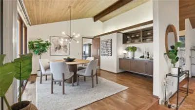 Custom built floating sideboard and shelves blends in beautifully in Dining Room.
