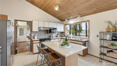 Refrigerator, microwave and exhaust hood newly replaced in the functional kitchen.