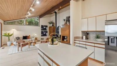 Seamless flow from Kitchen to Family room.