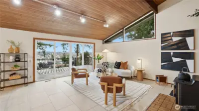 More sweeping Lake views from Family Room. Casual entertaining flows easily from indoor to outside on summer days!