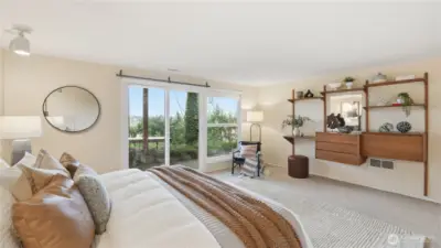 Lake view visible from Primary Suite with slider leading to patio.