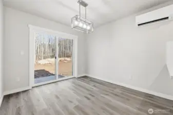 Dining area with slider to patio.