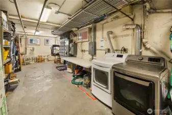 Community laundry room and storage (not pictured) in basement.