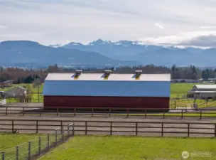 Dreamy photo of the barn and Olympic Mountains. Stunning!