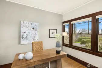 Spacious den-office with great light from south-facing windows and built-in shelves