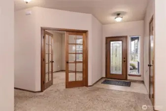 The French doors lead into one of the bedrooms.
