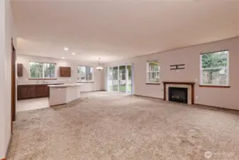 Great room concept, with natural gas fireplace.