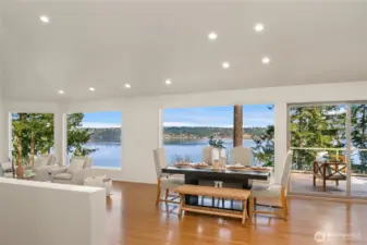 Open great room concept provides 180° views and showcases beautiful hardwood floors.