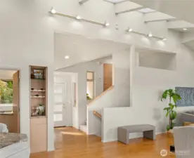 Soaring ceilings and skylights create volume and a sense of ease.