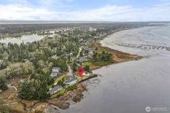 Unobstructed water and mountain views create a breathtaking backdrop.