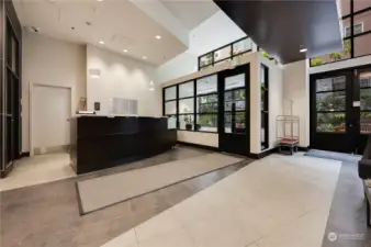 Here's a photo of the concierge desk & main entry to the Vine Condominium building.