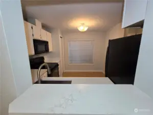 Looking back into the kitchen from the dining area.