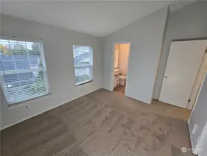 Notice the vaulted ceilings in this bedroom as well.