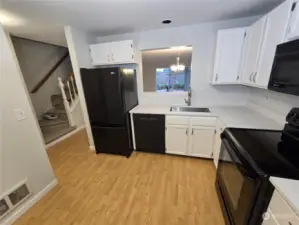 View of kitchen with pass through to the dining room