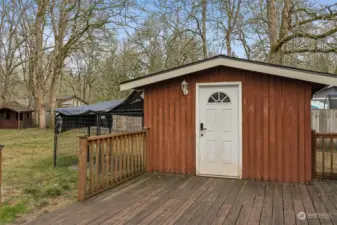 Think outside the box! This separate finished room, attached to the deck but distinct from the main house, is full of potential—art studio, guest quarters, home office, or remote business space. With its own vibe and privacy, the possibilities are endless.