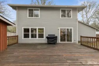 From the sliding glass door, it’s all about outdoor living on this large deck. With ample space for cooking, dining, and entertaining, this backyard is ready to become your go-to hangout spot for friends, family, and everything in between.