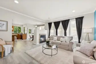 A dual sided fireplace brings warmth and ambiance to the main level.