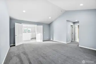 Presenting the primary bedroom as double French doors open up to your own personal retreat.