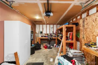 Garage bay. Storage shelves will all stay.