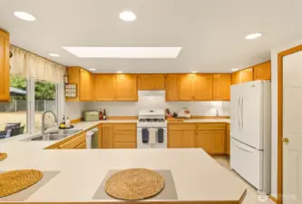 Pull up a chair to the bartop counter and keep the cook entertained.