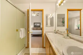 Sliding glass shower doors make for easy access.