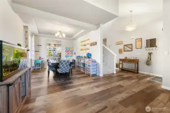 Large, front living space leads to dining