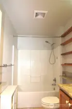 THE BATHROOM IS CENTRALLY LOCATED WITH A TUB/SHOWER COMBINATION!