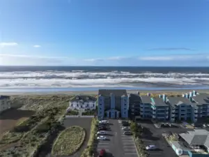 AERIAL VIEW OF OCEAN CREST CONDO BUILDING, PARKING LOT AND THE PACIFIC OCEAN!