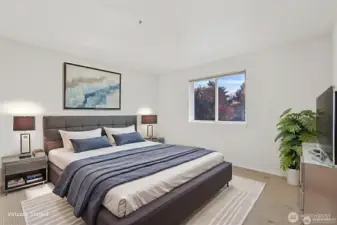 The primary bedroom is spacious with double closets