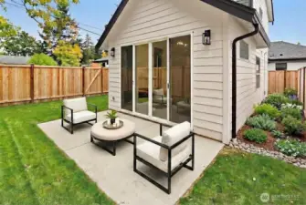Private fully fenced backyard with patio.