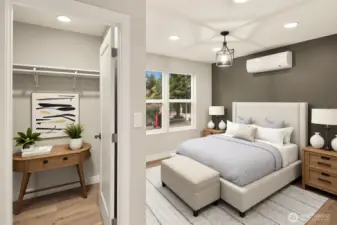 Upper level primary suite with mini-split heating/cooling system, walk-in closet & 8 ft ceilings.