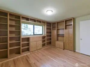 So many bookshelves, 3rd bedroom.  Owner used this space as a den/tv room.