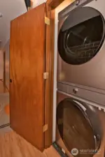 Utility closet off of hallway.  Full-size stackable W/D stay with home.