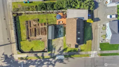 Birds eye view of property - Corner lot on N Winnifred St and N 49th St. Alley way is Rust Way.