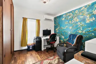 Bedroom 1 currently used as an office space. original built-in closet space. Mini-split for perfect temperature controlled room.