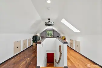Upstairs you enter the finished attic space with skylights, and built-in storage cabinets maximizing space. Beautiful hardwoods keep the charm of the house.