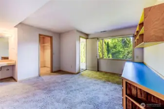 Bedroom #3 - Built-in desk, Vanity Sink, Walk-in Closet, and Private Access to Covered Patio