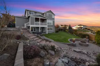 Back of the home. Nice firepit. Fully fenced~