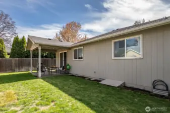 Covered patio & privacy hedge