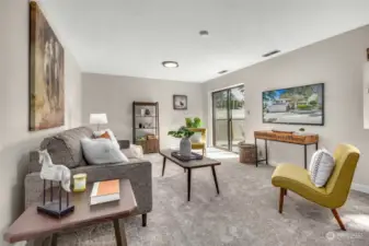 The lower daylight level offers a generous, flexible space to use in a variety of ways: from movie-watching to game-playing and general entertaining! A lovely patio and yard awaits just outside!