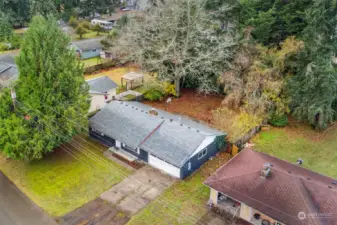 BIG completely FLAT yard with a fully fenced back yard.