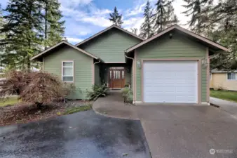 From the street - notice the 2-car attached garage, then there's another detached shop.