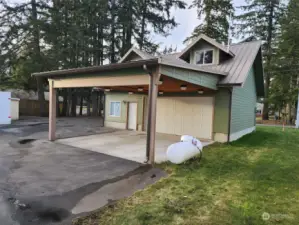 Detached shop with partially finished upstairs bonus room.