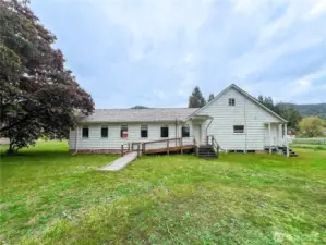 A sprawling expanse, perfect for building an outbuilding, hosting field games, and enjoying camping under the stars