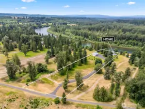A view looking West at property from high over Green Water Dr